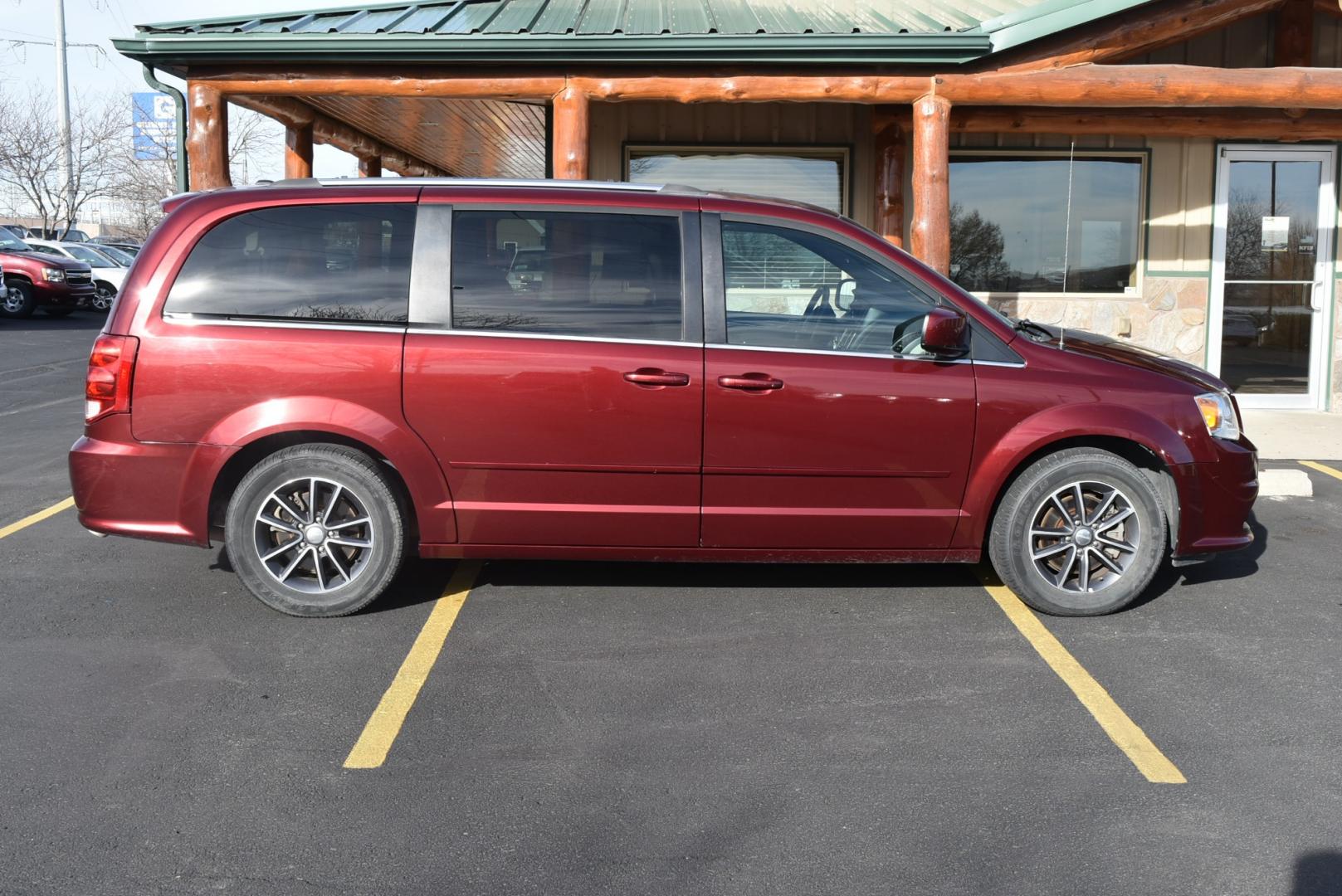 2017 Maroon /Black Dodge Grand Caravan SXT (2C4RDGCGXHR) with an 3.6L V-6 VVT 24 Valve Flex Fuel engine, 6-Speed Automatic transmission, located at 1600 E Hwy 44, Rapid City, SD, 57703, (605) 716-7878, 44.070232, -103.171410 - Photo#4